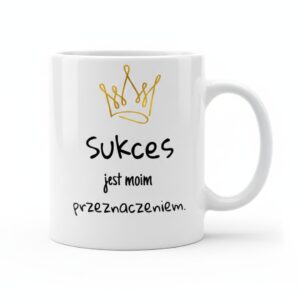 Biały kubek ceramiczny ze złotą grafiką korony i czarnym napisem afirmacyjnym "Sukces jest moim przeznaczeniem".